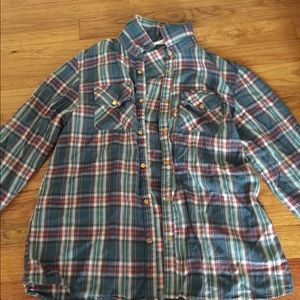 A girls buttoned down flannel.